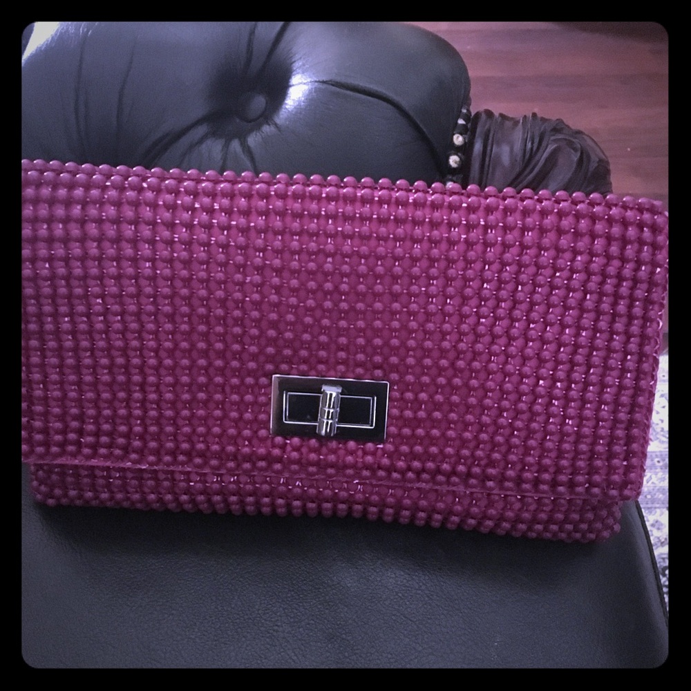 NWOT BCBG clutch. Excellent condition. 10”x6”x1”